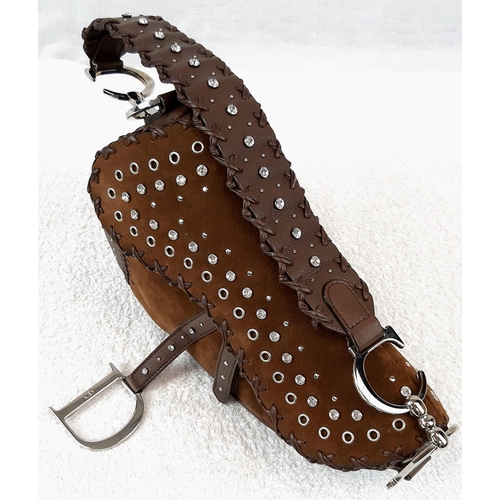 89 - A Christian Dior Suede Studded Saddle Bag. Decorated with studs and crystals - the suede body has a ... 