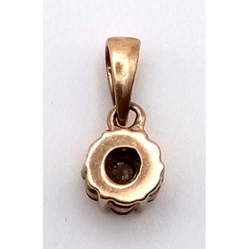 1126 - 9K YELLOW GOLD AND DIAMOND PENDANT   0.91G