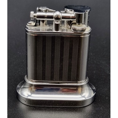 20 - A Rare Vintage Dunhill Longitude Silver Plated Table Lighter. Art deco design. Some wear on the silv... 