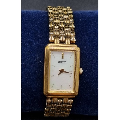 938 - An Yves Saint-Laurent and a Seiko Gold Plated Ladies Dress Watch. Both in good condition. Both quart... 