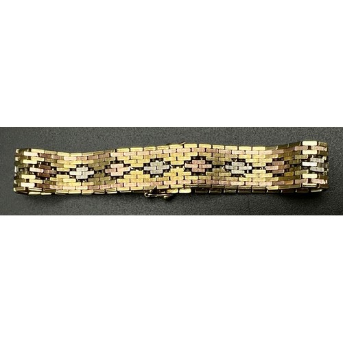 1176 - A Very Stylish 9k Yellow, Rose and White Gold Bracelet. Geometric link pattern. 19cm. 23.8g.