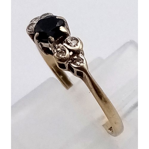 390 - 9K YELLOW GOLD DIAMOND AND SAPPHIRE RING 
1.1G SIZE L