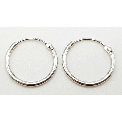 688 - 9K WHITE GOLD MINI HOOP EARRINGS 0.4G