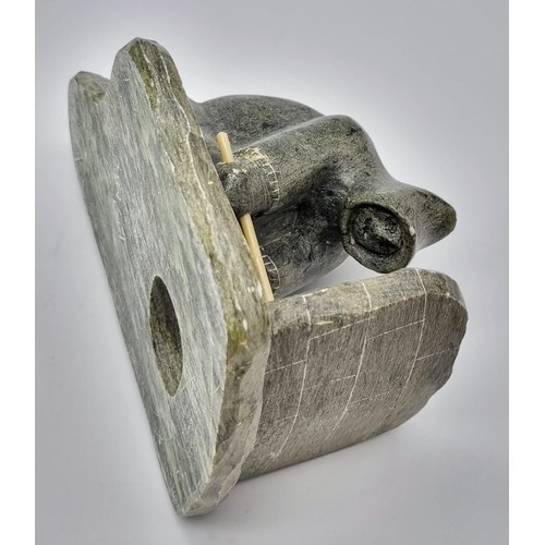 277 - An Antique Newfoundland and Labrador Inuit Soapstone Hand-Carved Figure of an Ice Fisherman.