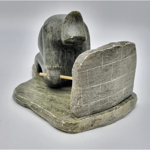 277 - An Antique Newfoundland and Labrador Inuit Soapstone Hand-Carved Figure of an Ice Fisherman.