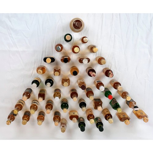 389 - A Wonderful Collection of Fifty Miniature Bottles of Whisky. All are unopened  - some are rare. Plea... 