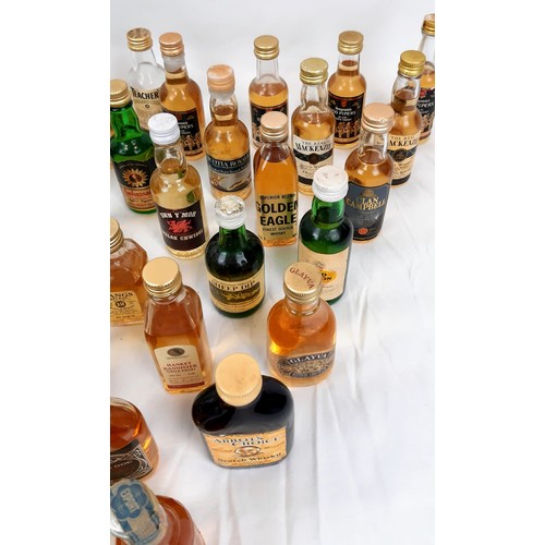 389 - A Wonderful Collection of Fifty Miniature Bottles of Whisky. All are unopened  - some are rare. Plea... 