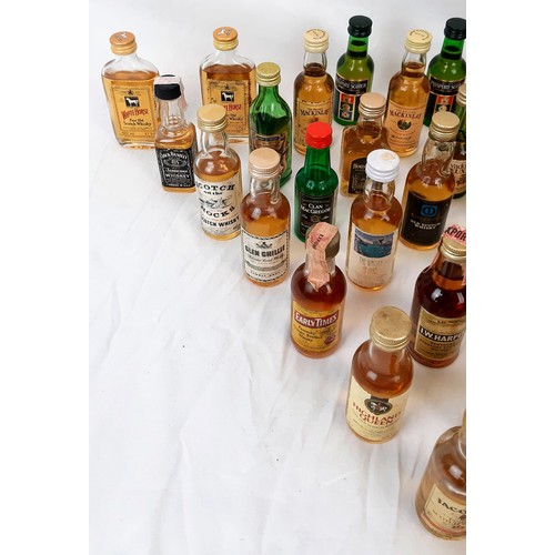 389 - A Wonderful Collection of Fifty Miniature Bottles of Whisky. All are unopened  - some are rare. Plea... 