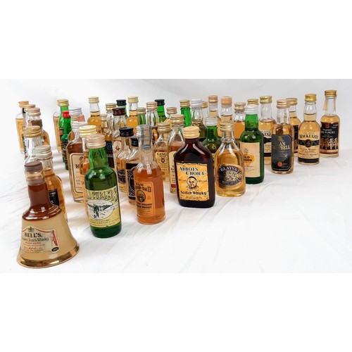 389 - A Wonderful Collection of Fifty Miniature Bottles of Whisky. All are unopened  - some are rare. Plea... 