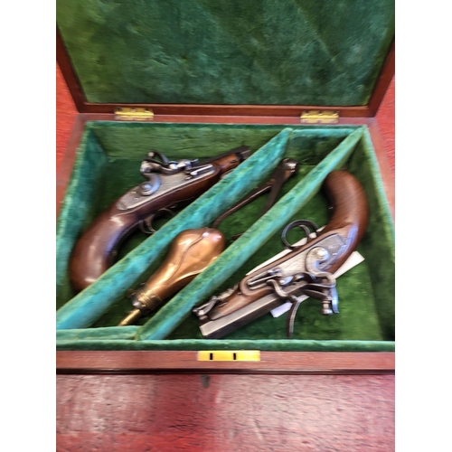 20 - A cased pair of flintlock Greatcoat Pistols by Leech of Colchester/renown gunmaker since 1790. Both ... 