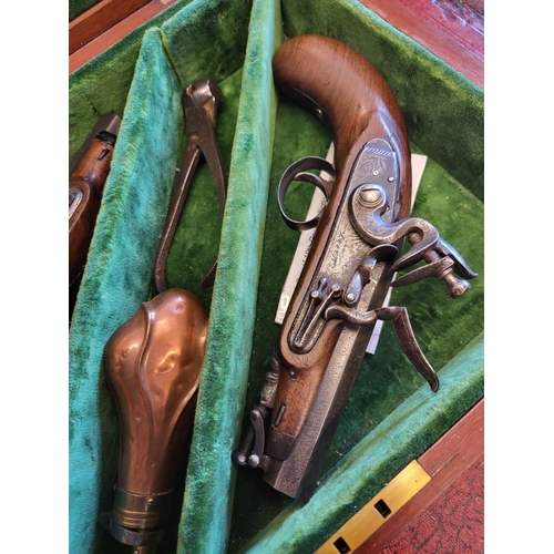 20 - A cased pair of flintlock Greatcoat Pistols by Leech of Colchester/renown gunmaker since 1790. Both ... 