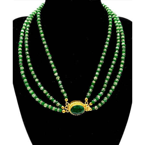 133 - A very feminine, 3 row faceted emerald and peridot necklace and bracelet set with large emerald clas... 