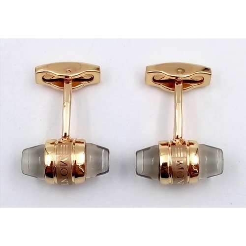 196 - A MONT BLANK – URBAN WALKER pair of cufflinks. Black/gold tone, torpedo shaped, with floating emblem... 