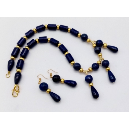 203 - A desirable lapis lazuli and gilded spacers necklace and earrings set in a presentation box. Necklac... 