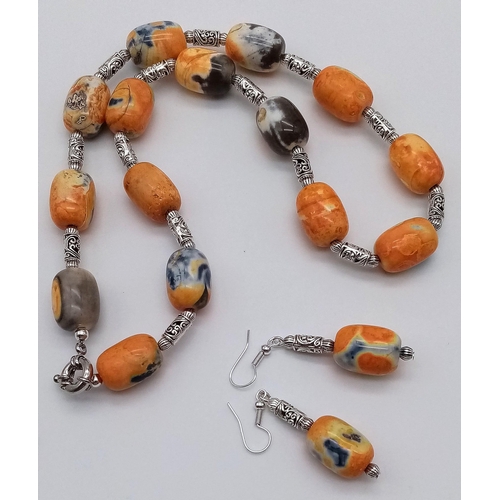 217 - A rarely seen and very collectable orange and black Namibian agate necklace and earrings set. Neckla... 