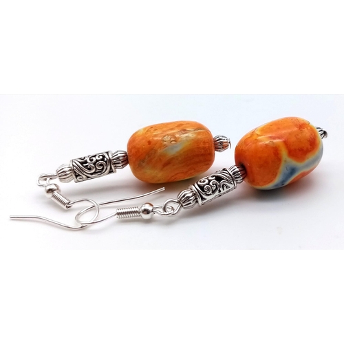 217 - A rarely seen and very collectable orange and black Namibian agate necklace and earrings set. Neckla... 