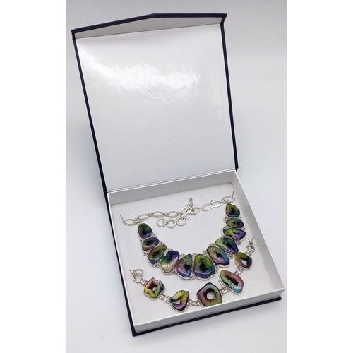 224 - A very individual solar quartz necklace and bracelet set in a presentation case. Necklace length: 43... 