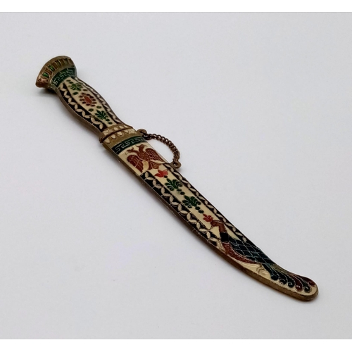 581 - Ornate dagger - see photos for finer details. Length: 25cm when sheathed