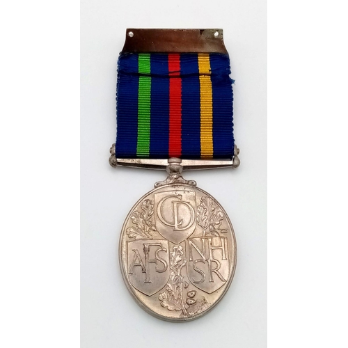 280 - Civil defence long service medal in royal mint case of issue. Un-named as issued. EF