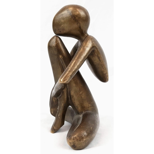 322 - Brass modernistic sculpture. Width 15cm, Height: 19cm.