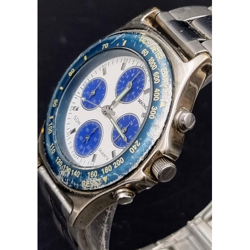 504 - A stainless steel Sekonda chronograph blue bezel quartz watch in working order. 38mm