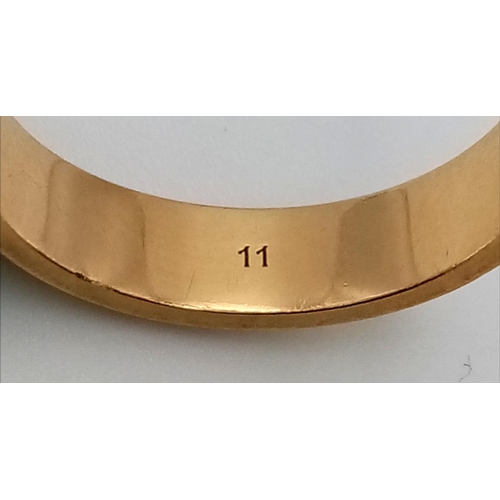 121 - An 18K Yellow Gold GUCCI Band Ring. Size K 1/2. 3.95g total weight.