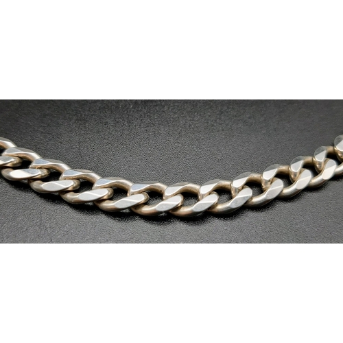 640 - A 925 Silver Chunky Flat Curb-Link Chain. 42cm. 51.13g total weight.