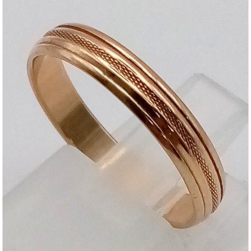 31 - A Vintage 14K Yellow Gold Band Ring. Linear design on exterior. Size N. 2.08g total weight.