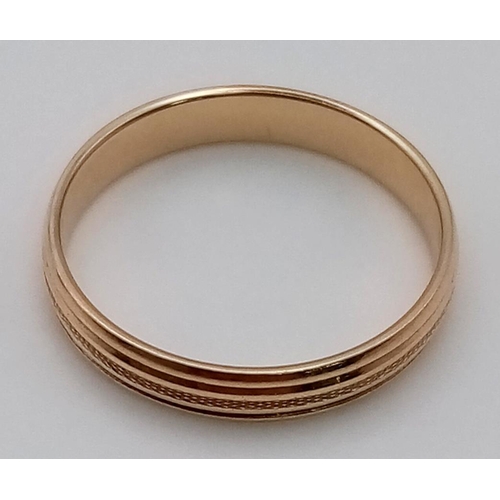 31 - A Vintage 14K Yellow Gold Band Ring. Linear design on exterior. Size N. 2.08g total weight.