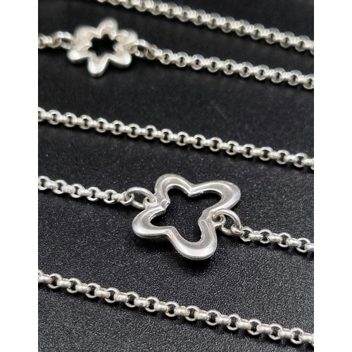 594 - A Vintage 925 Silver Rope Length Necklace with Star and Butterfly Decoration. 130cm. 34.28g