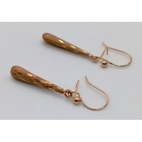 646 - A Pair of 9K Yellow Gold Teardrop Earrings. 2cm. 0.8g.