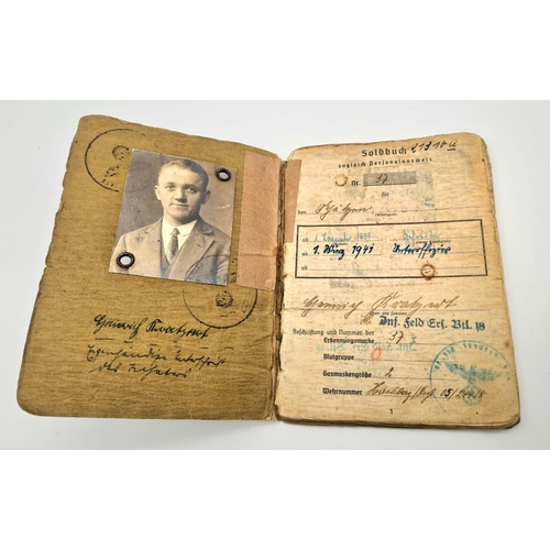 13 - WW2 German Pay Book for a Soldier who served from 1942 on the Russian front and active service until... 