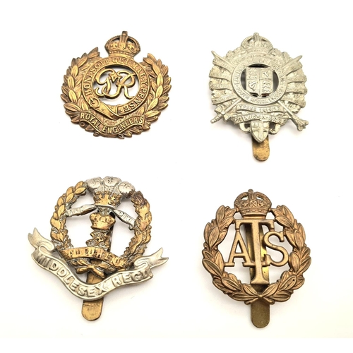 523 - 12x British Army Badges.