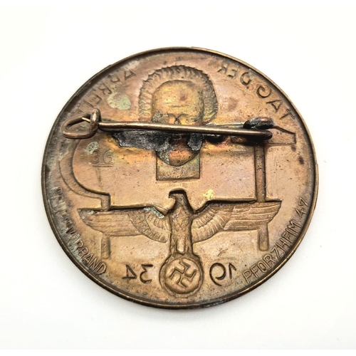 734 - 3rd Reich Workers Day Tinnie Badge 1934.