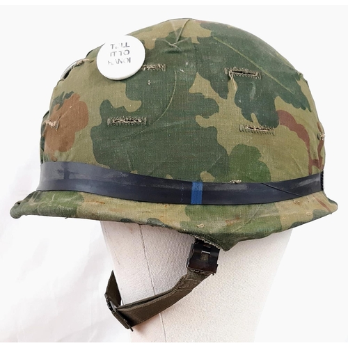 223 - Vietnam War Era US M1 Helmet and liner. Complete with a reversible Mitchel/Duck Hunter cover.