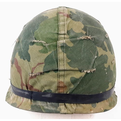 223 - Vietnam War Era US M1 Helmet and liner. Complete with a reversible Mitchel/Duck Hunter cover.