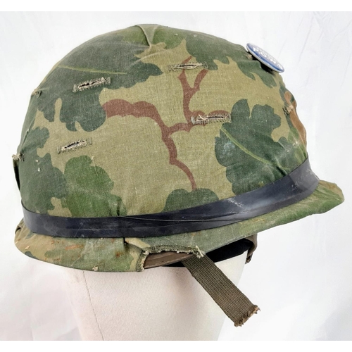 223 - Vietnam War Era US M1 Helmet and liner. Complete with a reversible Mitchel/Duck Hunter cover.