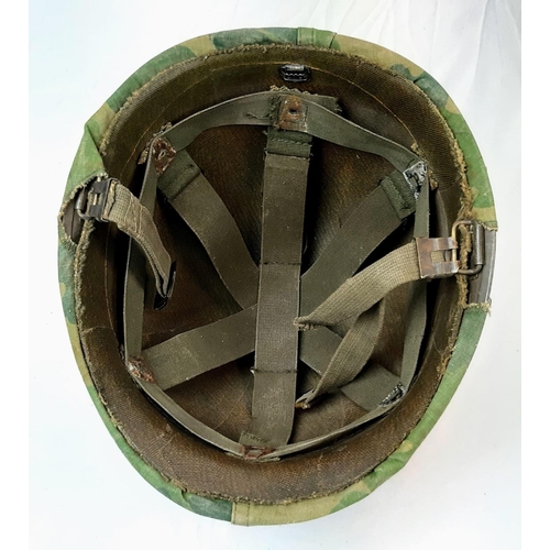 223 - Vietnam War Era US M1 Helmet and liner. Complete with a reversible Mitchel/Duck Hunter cover.