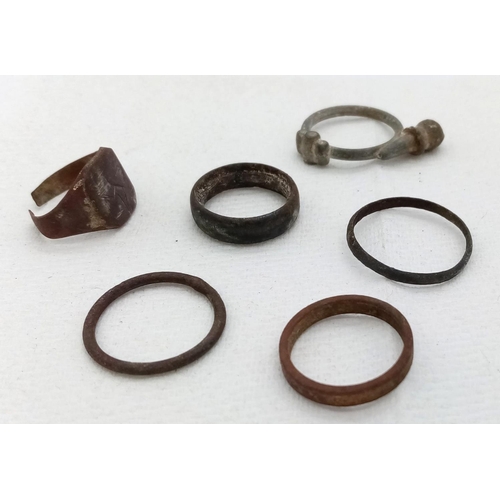 361 - An interesting collection of 15 excavated Roman and Medieval rings and possibly 1 coin.