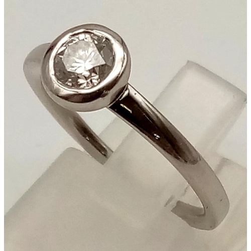 37 - An 18K White Gold Diamond Solitaire Ring. 0.55ct diamond. Size M 1/2. 3.4g total weight.