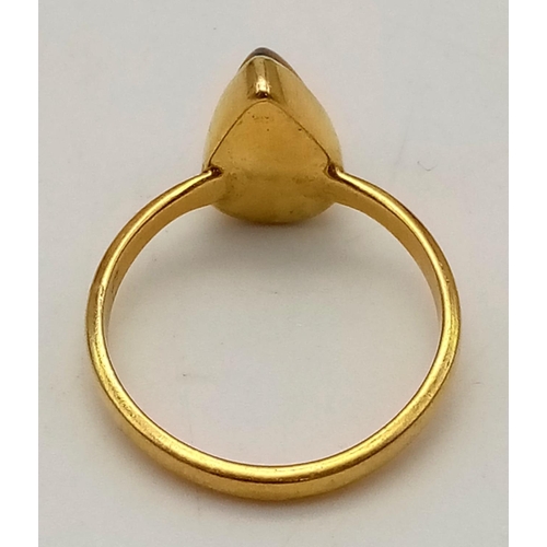 418 - Black teardrop opal stone set in gold metal, opal 1cm in length, ring size P.