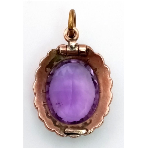 425 - Antique style Amethyst and a halo of seed pearls pendant. 26mm in length, weights 2 grams