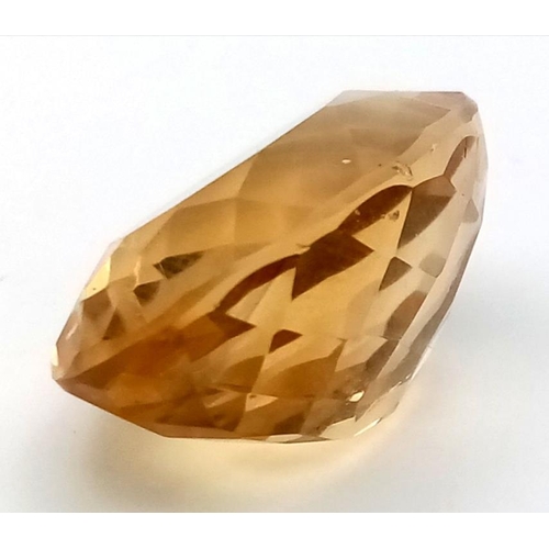 431 - A 28ct Faceted Citrine Gemstone. 5.81g total weight. 2.5cm.