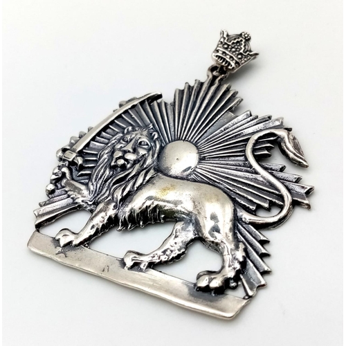 438 - A Vintage Persian Lion and Sun Emblem Silver Pendant.
6cm.