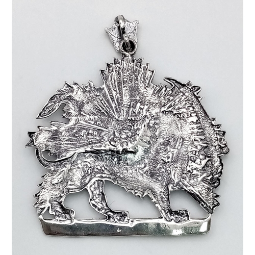 438 - A Vintage Persian Lion and Sun Emblem Silver Pendant.
6cm.