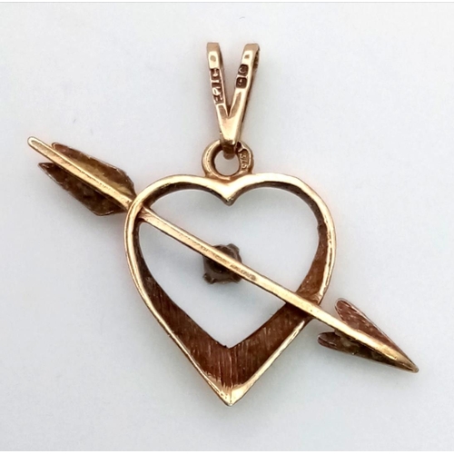 733 - A Vintage 9K Yellow Gold Diamond Cupid Heart Pendant.
25mm. 0.8g