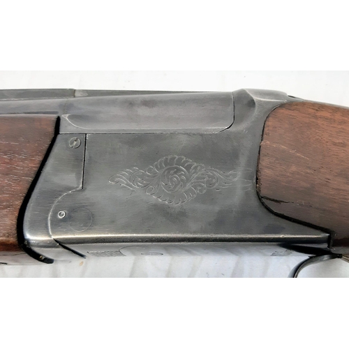 679 - A Deactivated Russian Double-Barrelled Shotgun. 12 Bore calibre with two 28.5 inch up and over barre... 