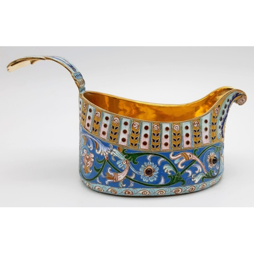 607 - A Delightful Russian Silver and Cloisonné Enamel Kovsh. Gem-set decoration throughout with a richly ... 