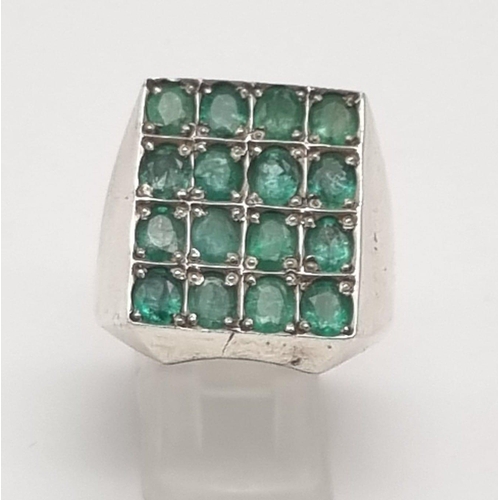 395 - A Vintage Natural 16 Stone Emerald Ring. Over 5ct of oval emeralds arranged in a rectangle -23 x 18m... 