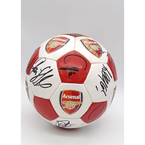 23 - An Authentic Arsenal FC 2003 F.A. Cup Winning Squad Signed Football. Over 20 signatures: Including: ... 